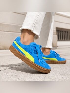 Puma Women's Bright Blue Suede Sneakers with Neon Yellow Stripe